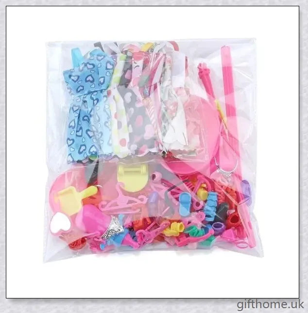 An assortment of 85 Barbie doll accessories including dresses, shoes, jewellery, and other fashion items