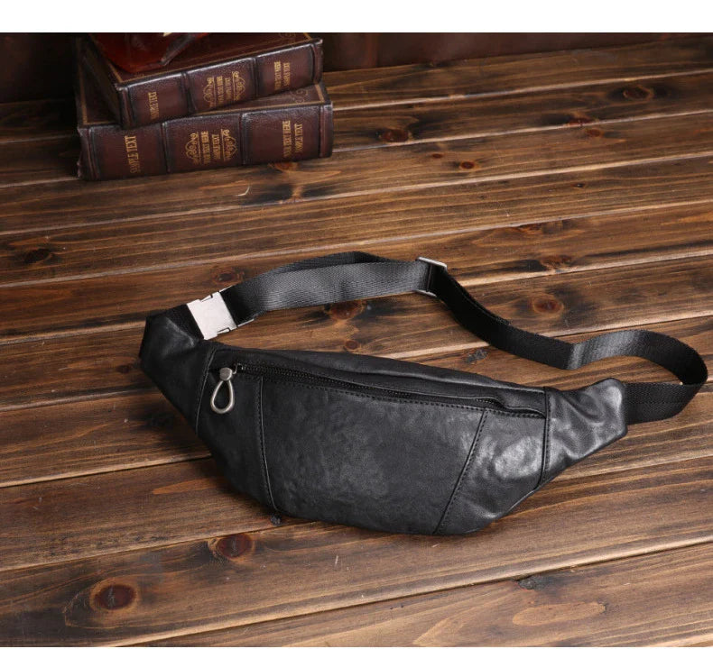 A premium black leather sports waist pack with multiple pockets and an adjustable strap for hands-free mobility and convenience.