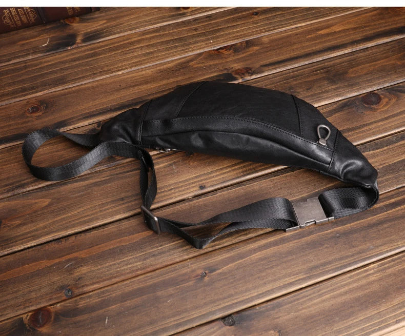 A premium black leather sports waist pack with multiple pockets and an adjustable strap for hands-free mobility and convenience.