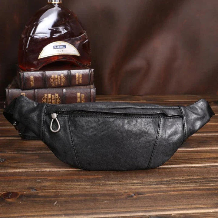A premium black leather sports waist pack with multiple pockets and an adjustable strap for hands-free mobility and convenience.