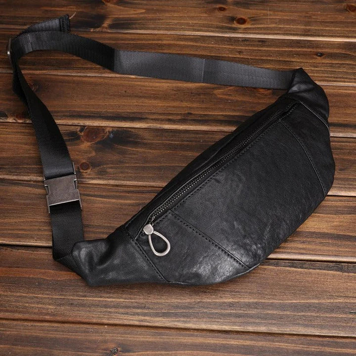 A premium black leather sports waist pack with multiple pockets and an adjustable strap for hands-free mobility and convenience.