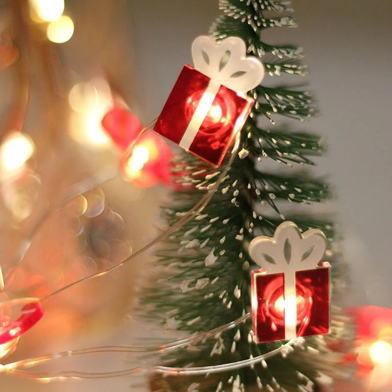 Festive LED string lights with Christmas-themed ornaments for home and party decor