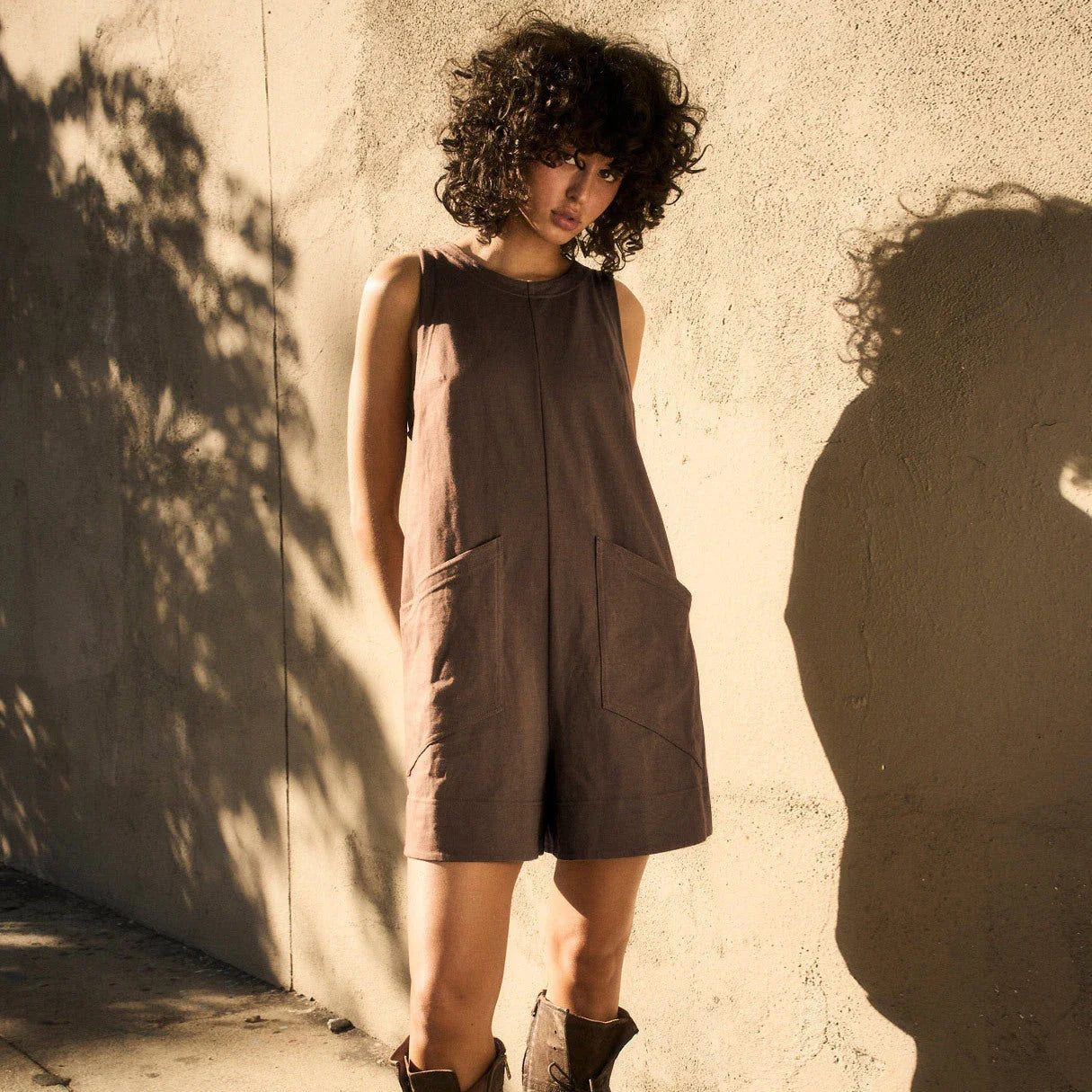Stylish and comfortable cargo jumpsuit with pockets in various colors, including coffee, dark grey, army green, black, beige, and rose red.