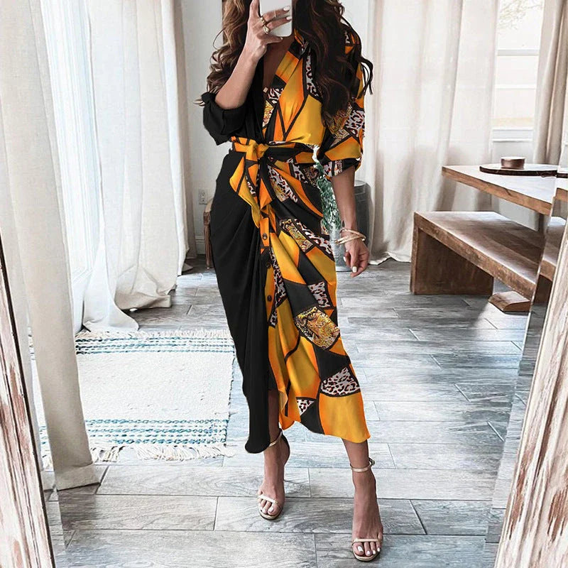 A beautiful floral wrap dress with lace-up detailing, featuring a deep V-neck and full-length skirt for a flattering, elegant look.