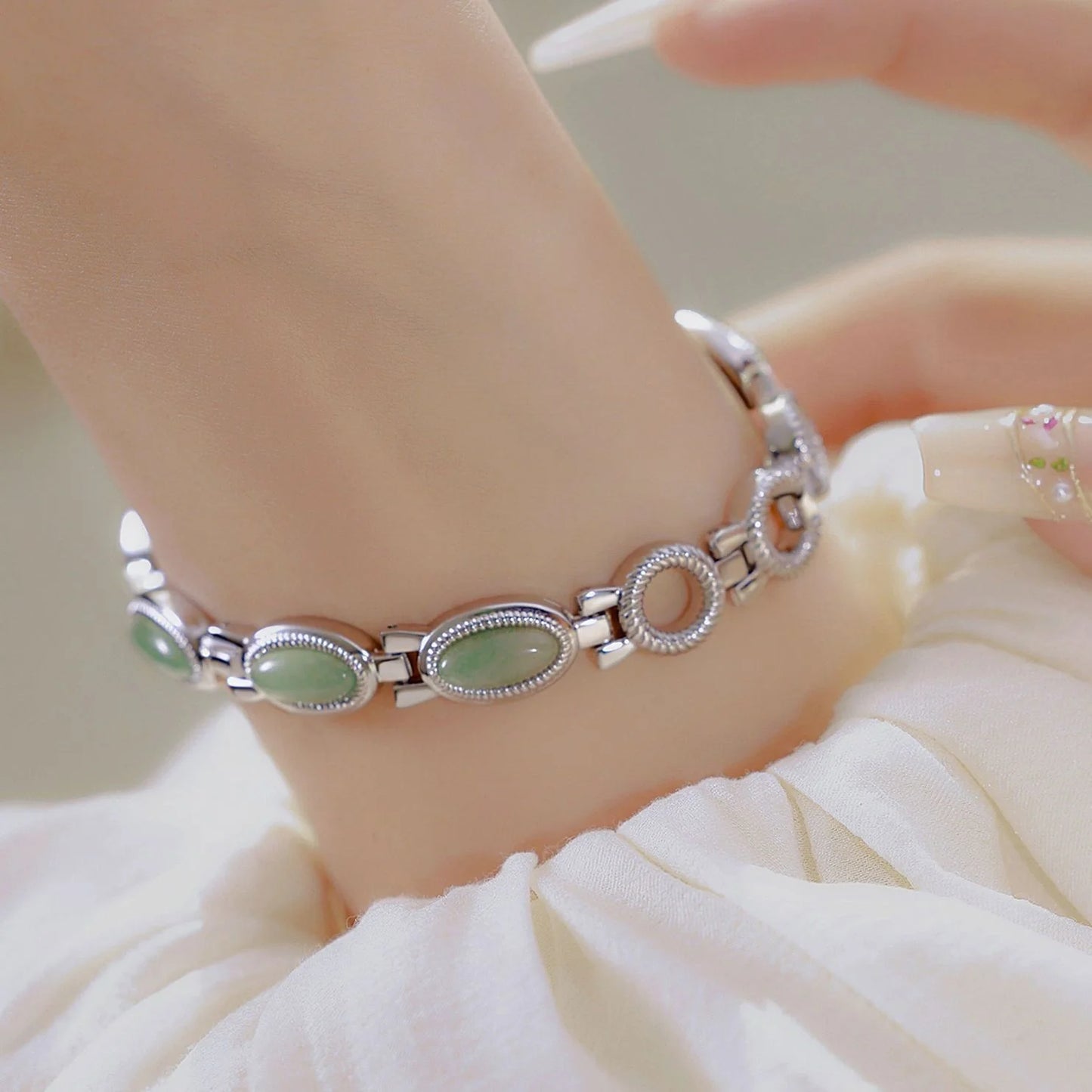 Luxury women's bracelet watch with Hetian Jade and Dongling Stone accents