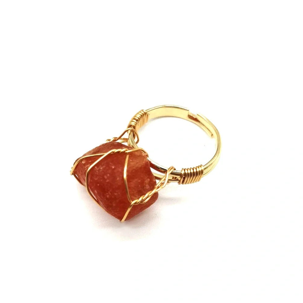 Handcrafted agate stone ring featuring an array of natural gemstones in various colours, with an adjustable design for a customized fit.