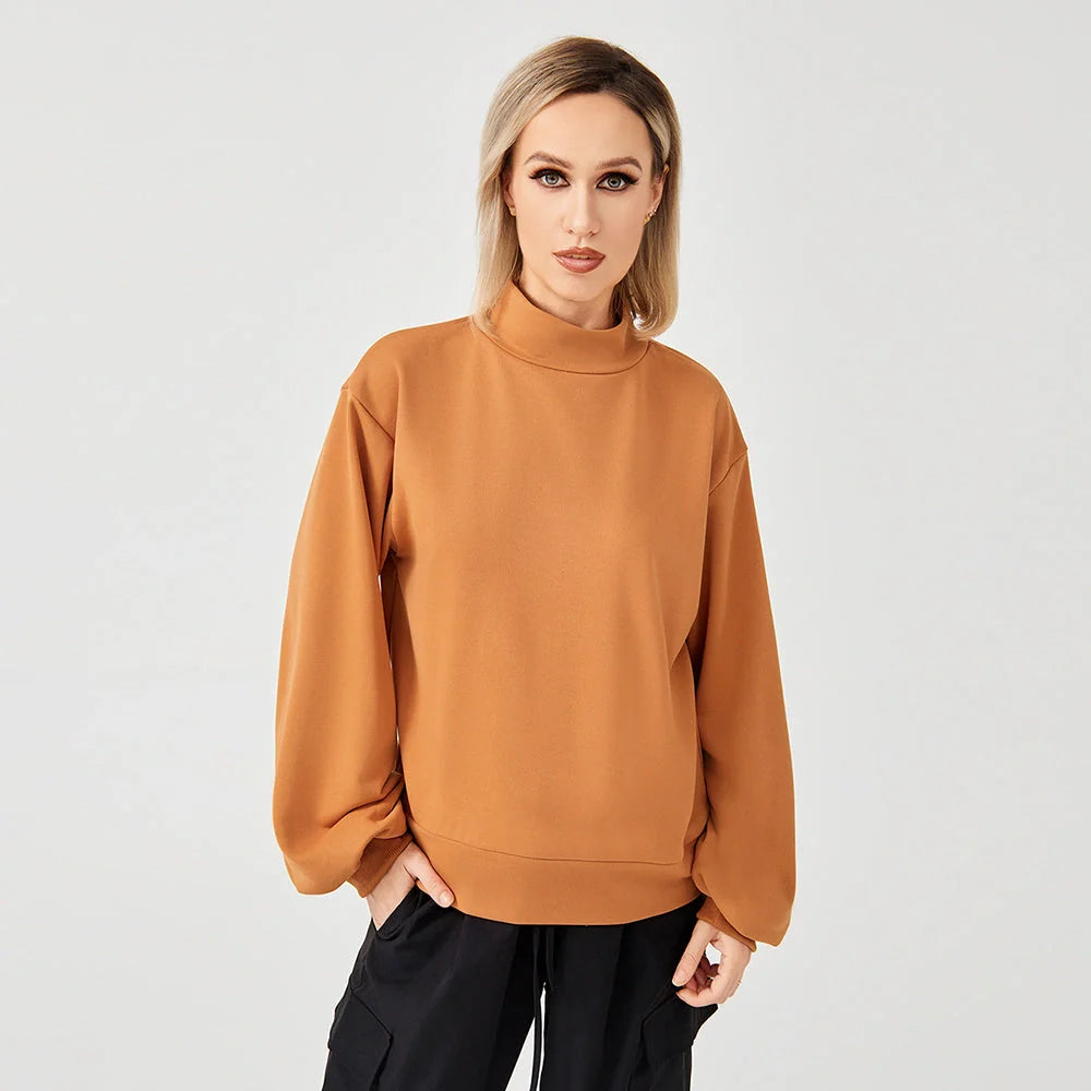 Soft, cosy women's sweatshirt in black, grey, and coffee colours with a relaxed, flattering fit