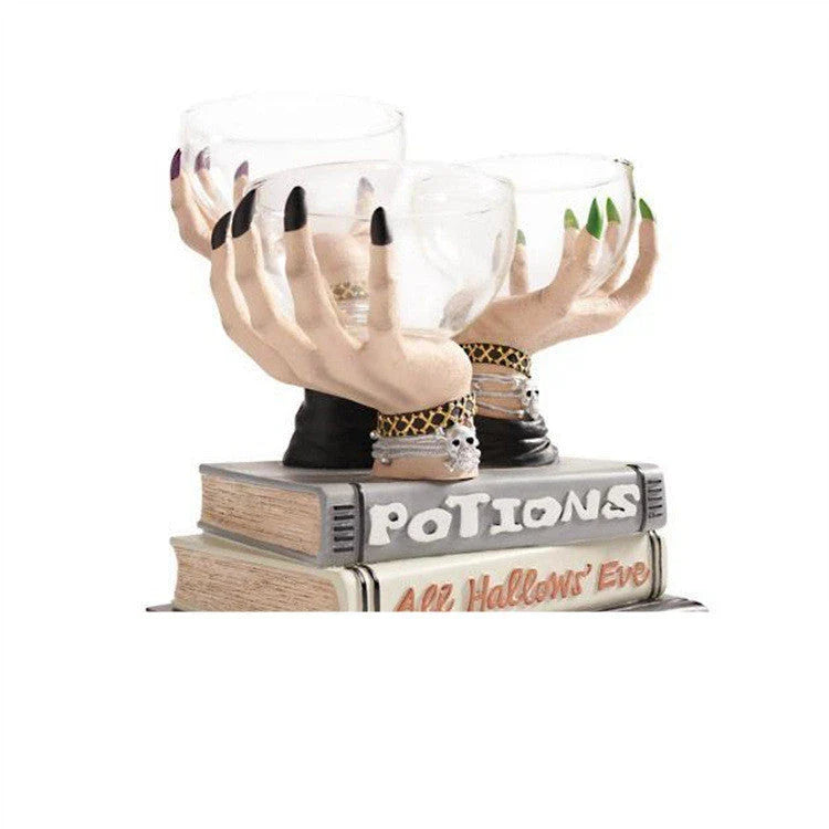 Bewitching Halloween snack bowl stand with transparent bowls and unique witch's hand design