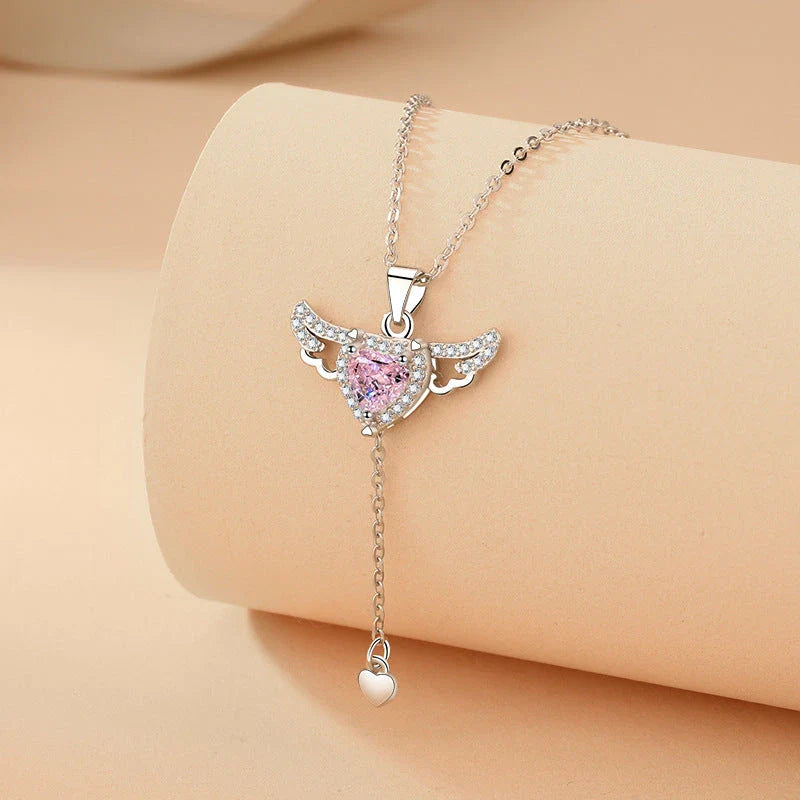 Enchanting necklace with Cupid heart and fluttering angel wings, crafted with titanium steel and sparkling zircon crystals