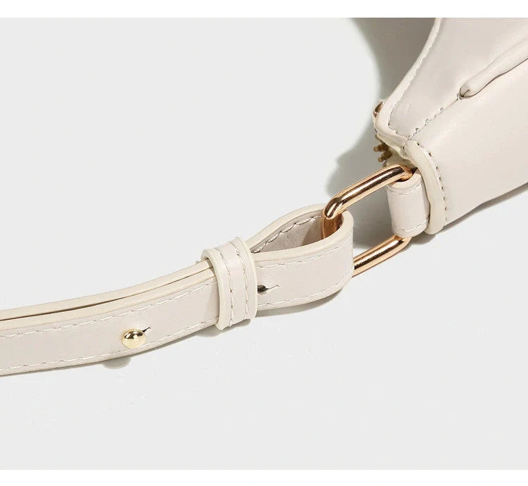 Stylish women's PU leather dumpling crossbody bag in black and white