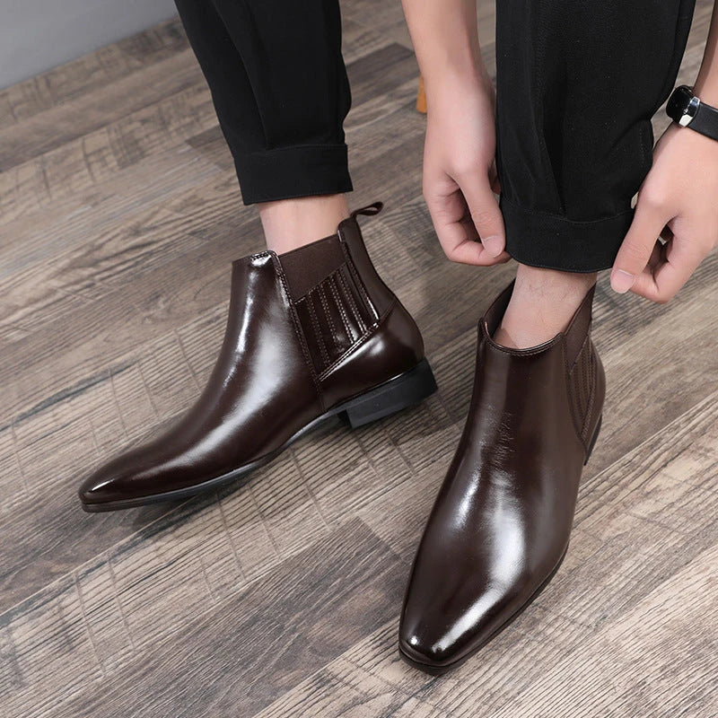 Stylish pointed toe Chelsea boots for men in black and brown colors, featuring a square heel and British-inspired design.
