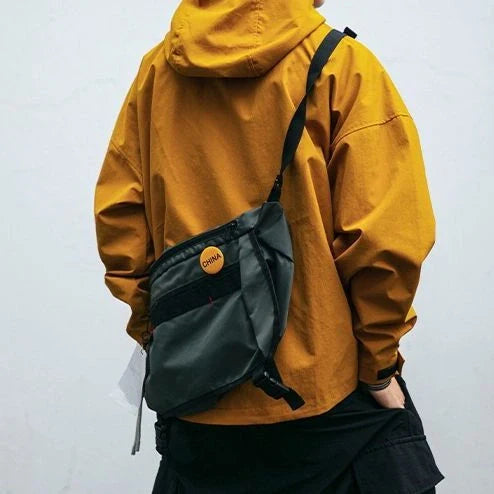 Men's hooded jacket in black, yellow, or green with windproof feature and three-dimensional pockets