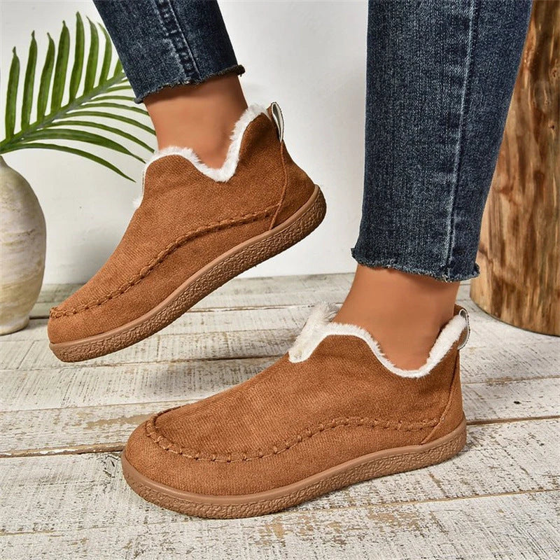 Stylish plush ankle boots with V-cut design, available in dark grey, black, light brown, and milky white colors