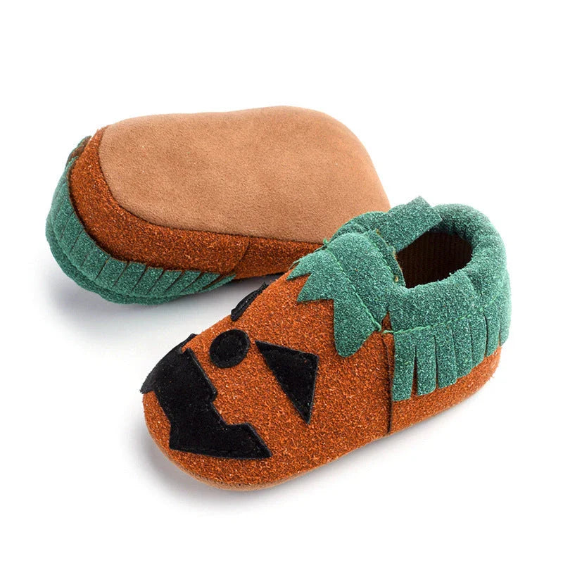 Adorable Halloween-themed pumpkin slip-on shoes for toddlers in vibrant yellow