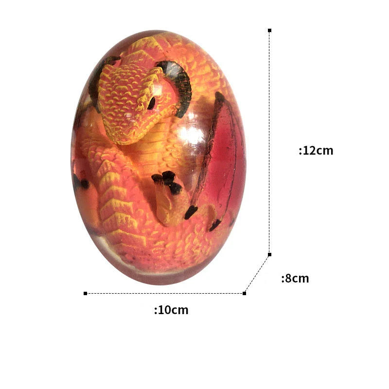A crystal-clear resin dragon egg decor with a realistic 'lava dragon' design, perfect for fantasy and fossil enthusiasts.