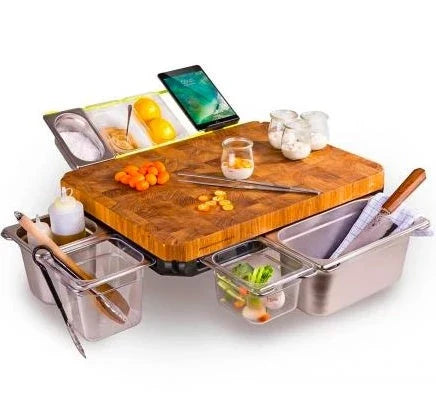 Bamboo cutting board with plastic storage trays for organizing and containing chopped food items