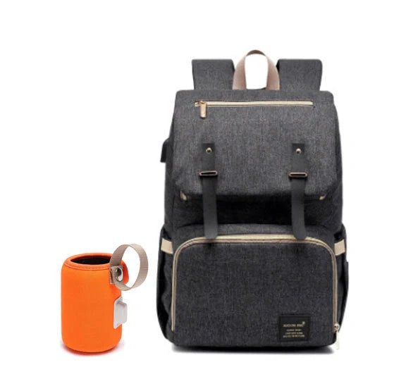 Versatile mummy bag with stroller hooks, side pockets, and zippered compartments for storing baby essentials
