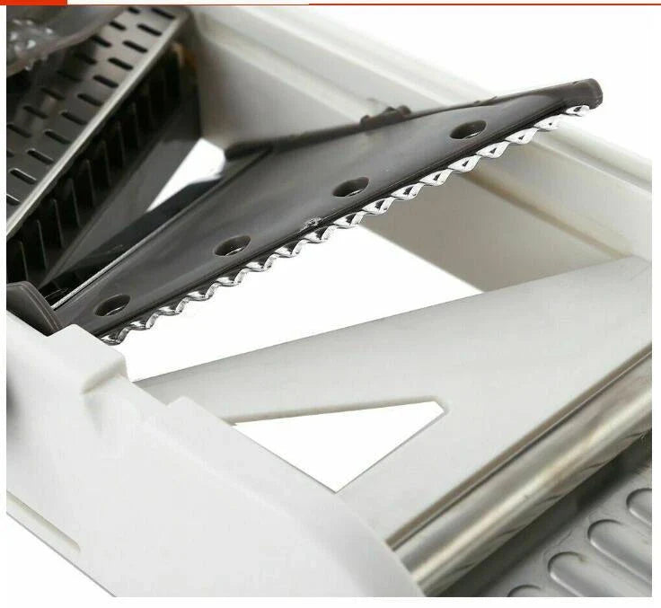 The Versatile Vegetable Slicer with adjustable slicing, shredding, and waffle cutting capabilities for easy meal preparation