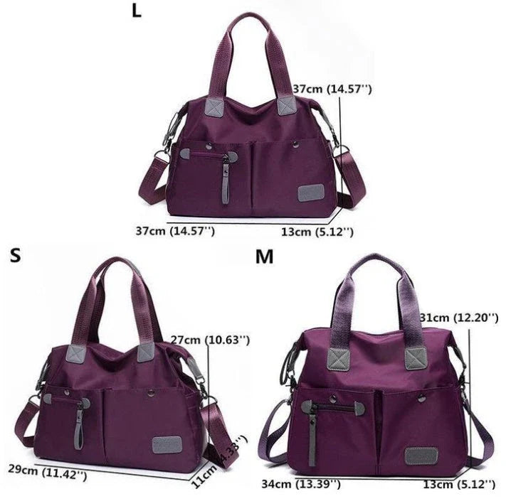 Versatile ladies shoulder bag with multiple carry options, numerous pockets, and durable Oxford fabric construction