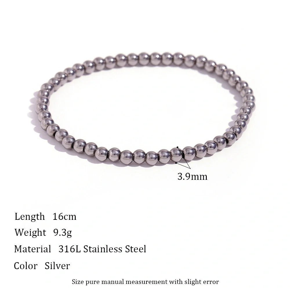 Vintage-inspired stainless steel and 18K plated elastic bead bracelet in a range of sizes and colours