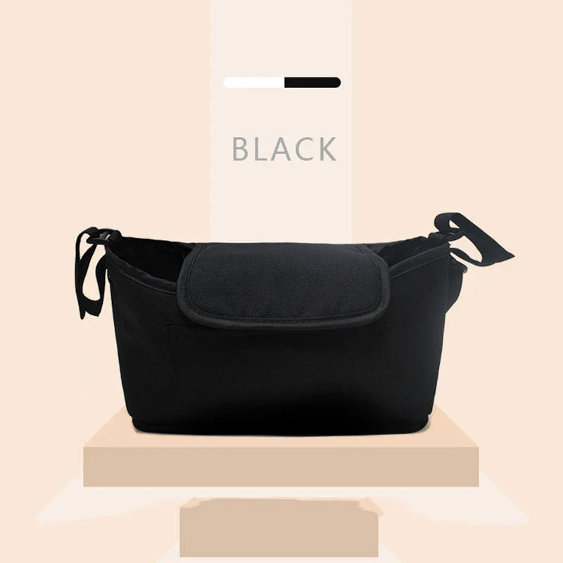 Stylish baby pram organiser bag made of premium cotton and linen materials, featuring various compartments and colour options to keep your child's essentials organised.