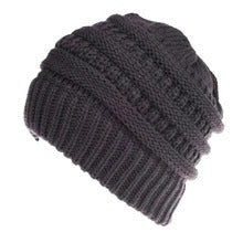 Stylish knitted wool beanie for British ladies with a discreet ponytail hole and a variety of vibrant colour options