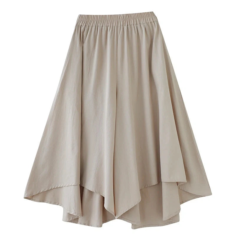 Stylish ladies' loose cropped trousers in various colours, including black, light green, blue, and apricot
