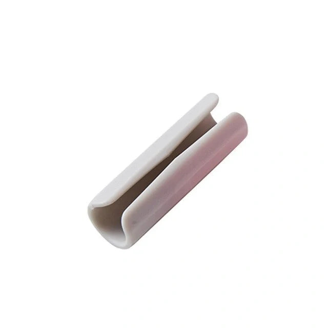 Non-slip sheet fixing clips in various colours for securing bedding and cushions