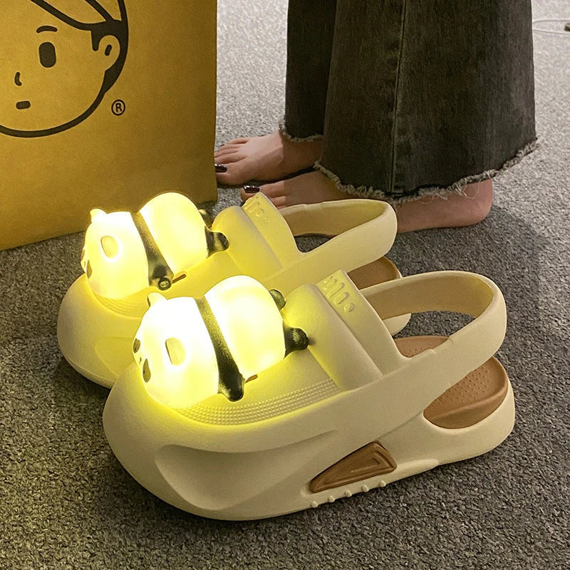 Adorable panda-themed slip-on slippers in various colors and sizes, featuring a lightweight and breathable design for comfortable everyday wear.