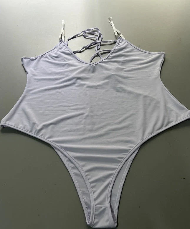 Stylish backless one-piece swimsuit in various vibrant colors for curvy women