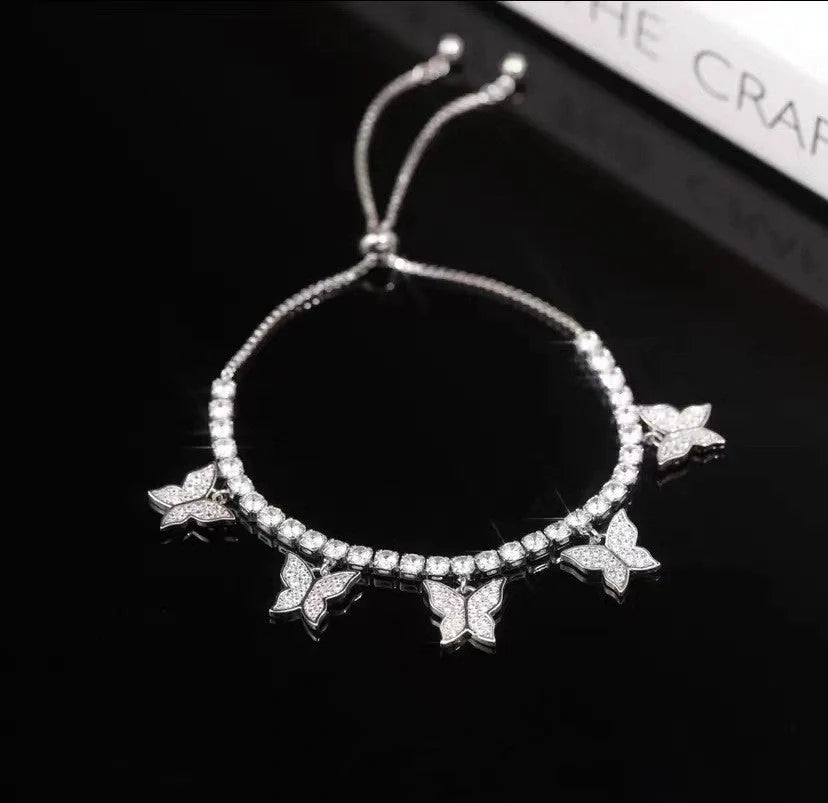 Adjustable Multi Butterfly Bracelet with zircon stones on a heart-shaped copper band