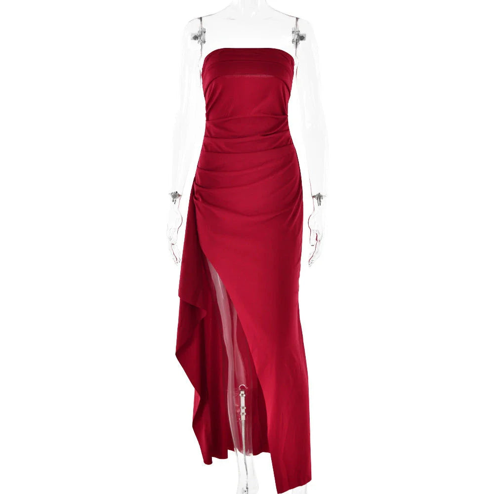 Stunning backless maxi dress in various colors, featuring a pleated A-line skirt and strapless silhouette for elegant occasions.