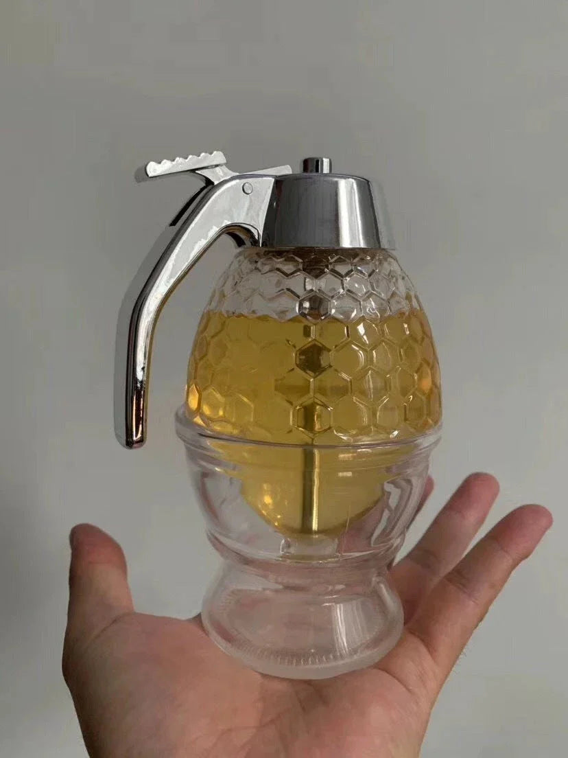 Premium acrylic honey dispenser with transparent body and precise spout for drip-free honey serving