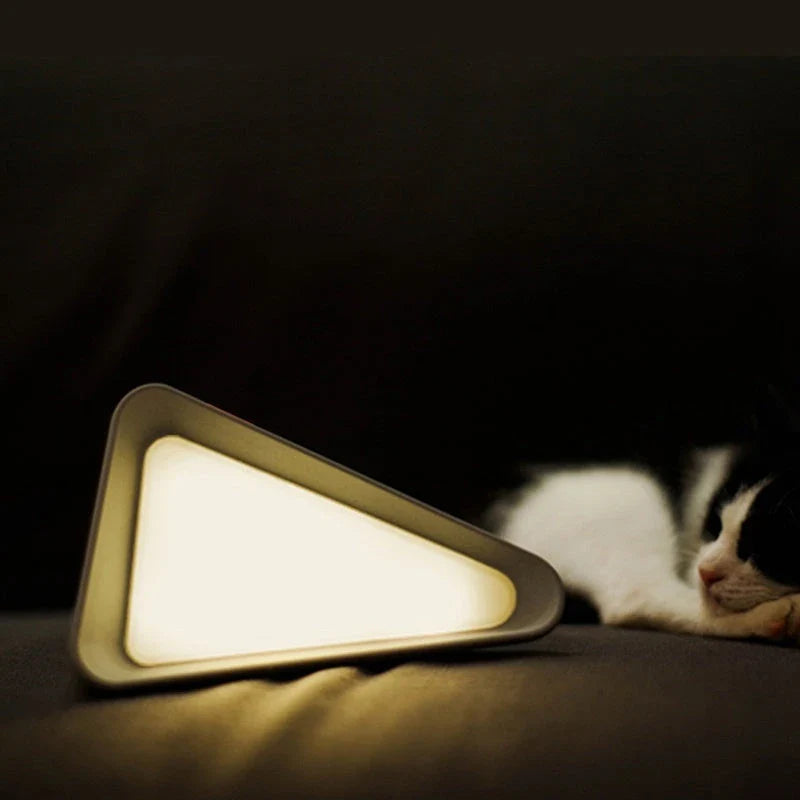 Adjustable flip-up LED night light with USB charging, dimmable brightness, and compact, creative design perfect for desks or bedside tables