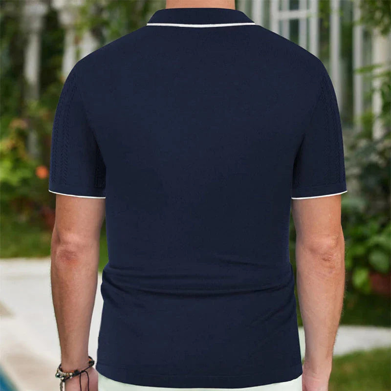 Stylish short-sleeved polo shirt with unique flocked design, available in a variety of rich colors for versatile summer style