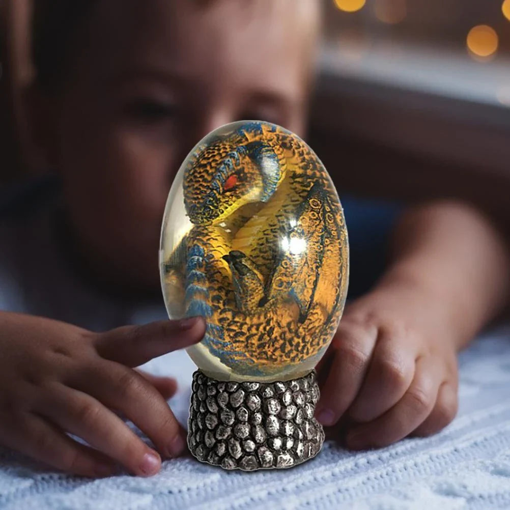 A crystal-clear resin dragon egg decor with a realistic 'lava dragon' design, perfect for fantasy and fossil enthusiasts.