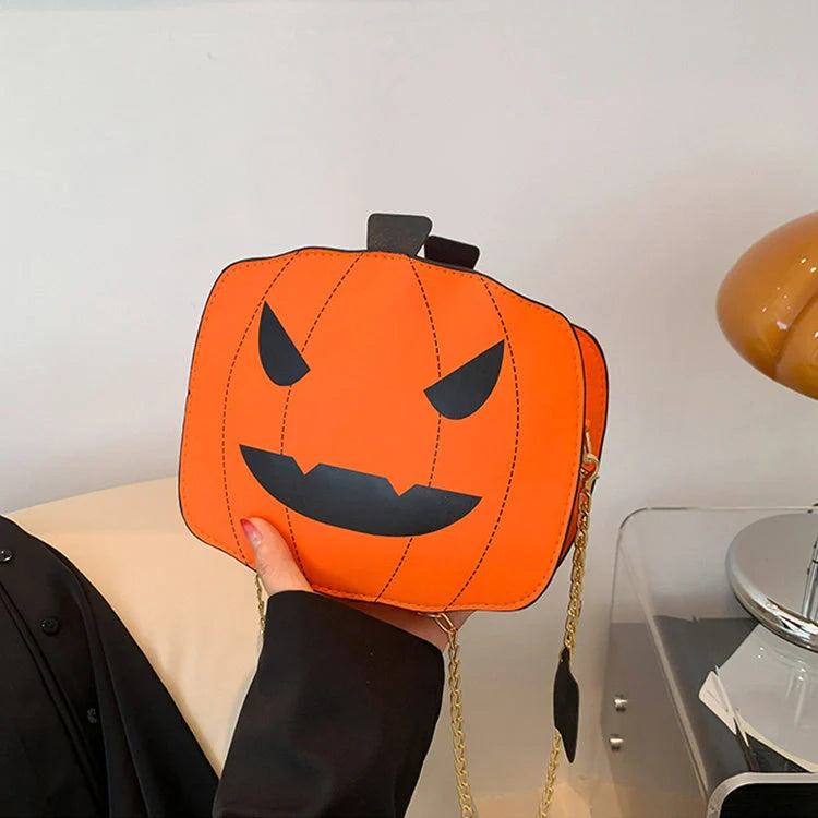 Enchanting Halloween pumpkin-themed shoulder bag in various colours, featuring an adjustable chain strap and trendy urban style