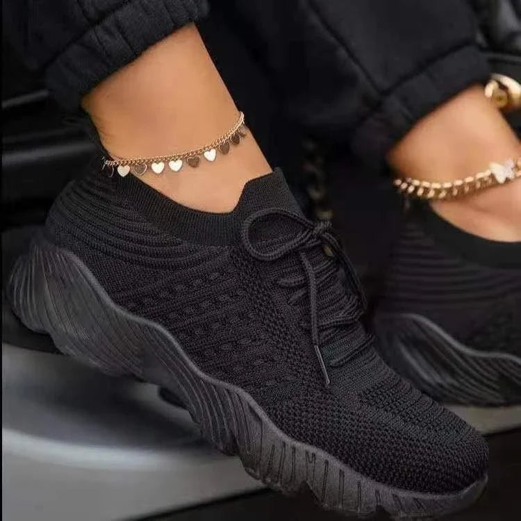 Women's Knit Sneakers in various colors, featuring a lightweight, breathable design and cushioned soles for all-day comfort.