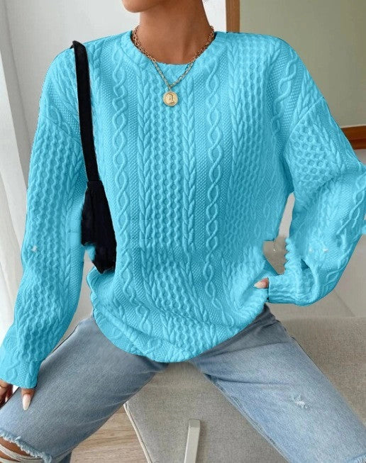 Cosy and stylish women's oversized jacquard hoodie in black, white, and blue colours