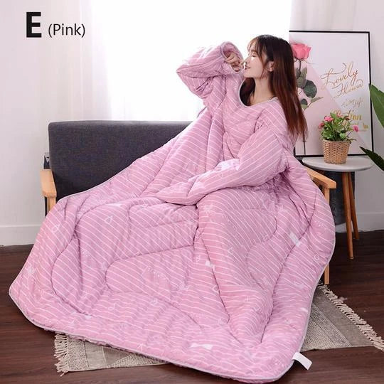 Cozy quilted lounger with sleeves in various colors and sizes, perfect for year-round indoor comfort and relaxation.