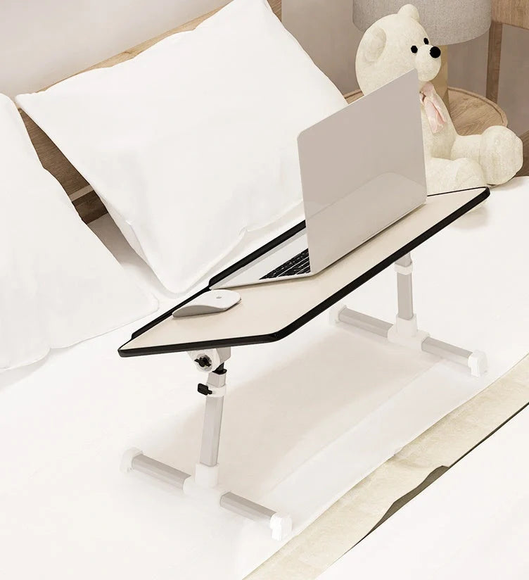 Adjustable laptop desk stand with foldable design for bed or standing use