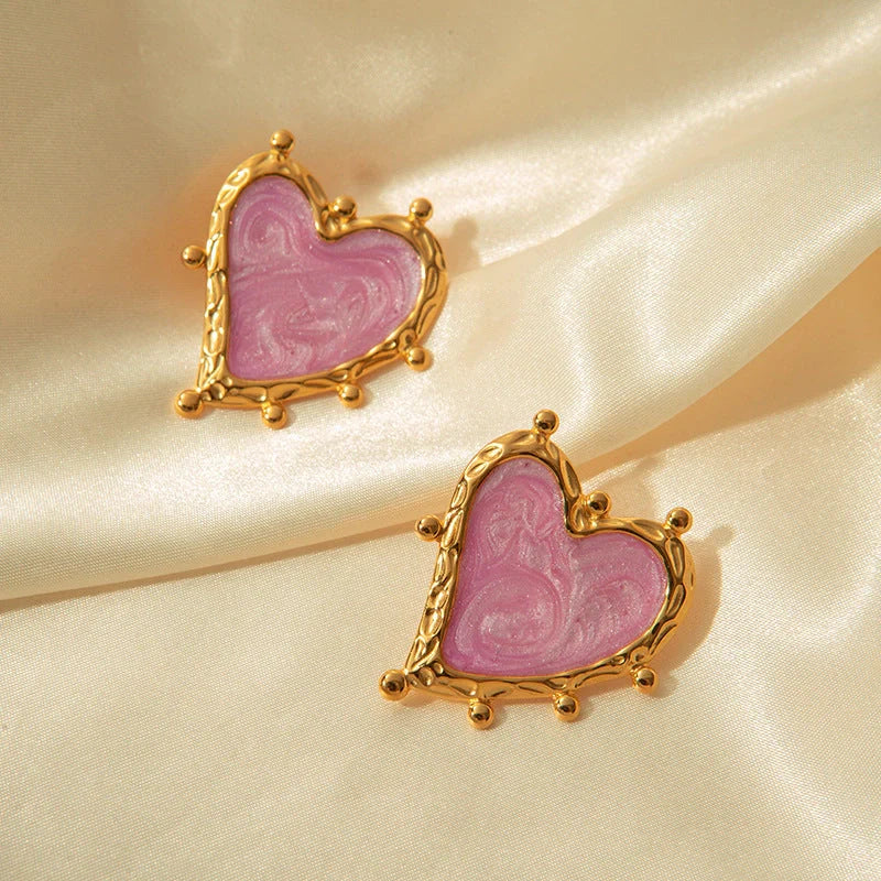 Elegant stainless steel heart-shaped earrings in a range of captivating colours, perfect for adding a touch of romantic flair to any outfit.
