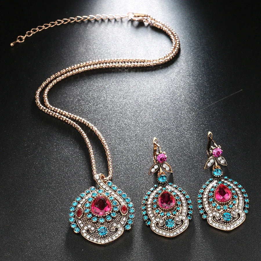 Elegant bohemian-style jewellery set featuring necklaces, earrings, and rings in a variety of colours and sizes
