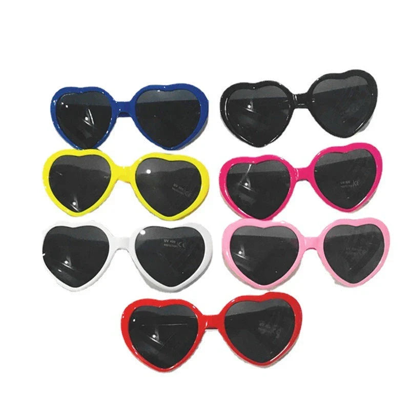 Stylish heart-shaped sunglasses with unique lens design that transforms light into enchanting special effects
