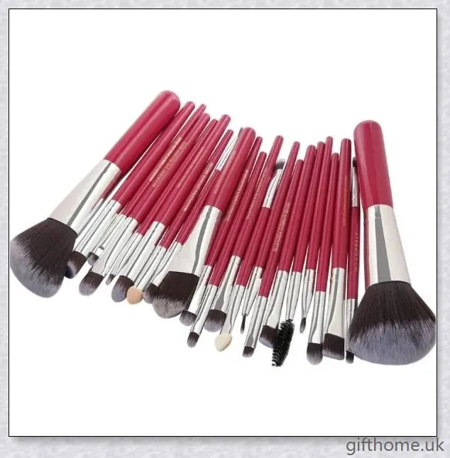 22-piece set of high-quality cosmetic makeup brushes with soft, silky bristles and long, easy-grip handles for flawless application