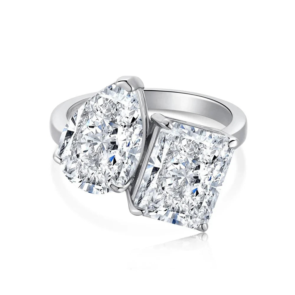 Elegant pear-shaped two-tone diamond ring with a captivating silhouette and premium finish