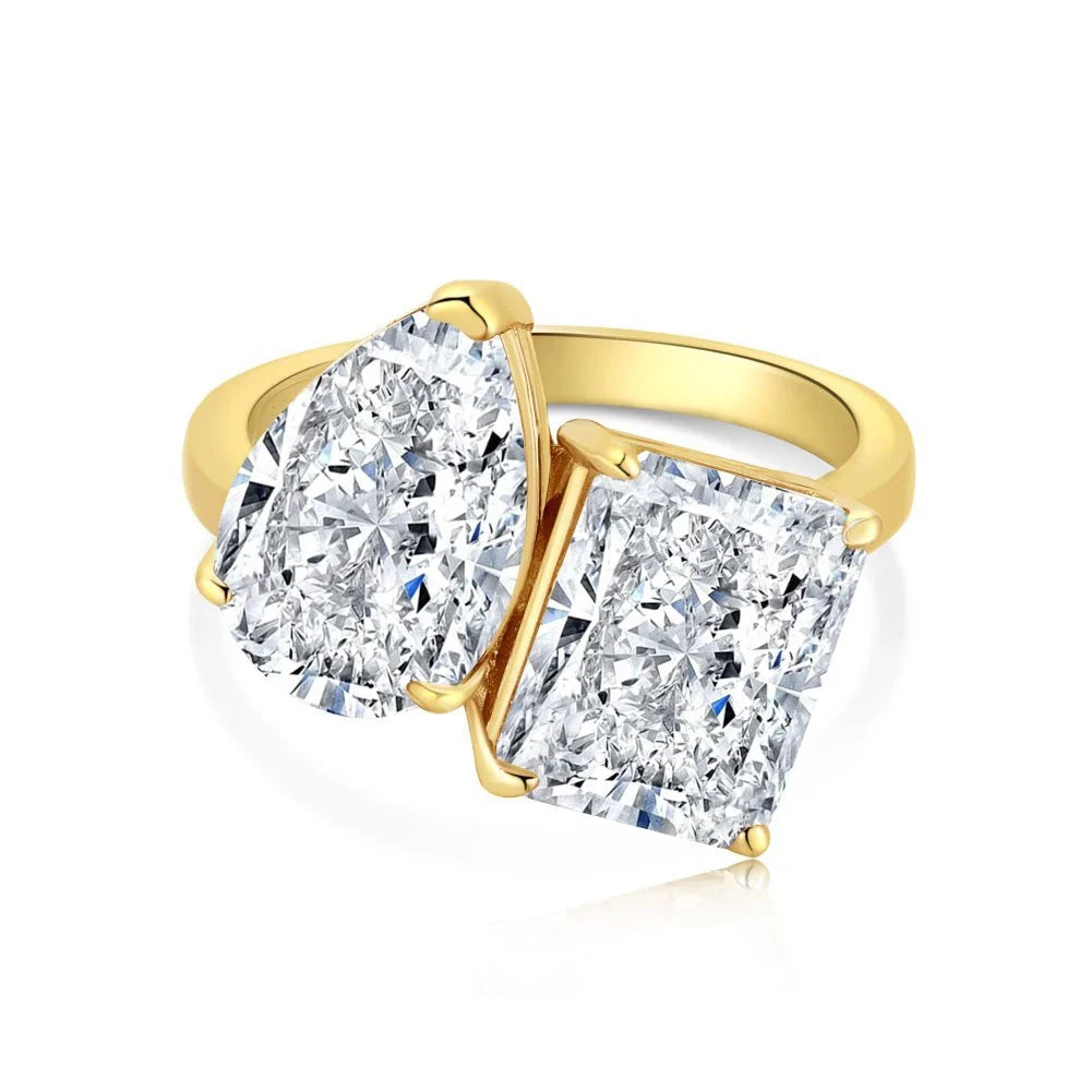 Elegant pear-shaped two-tone diamond ring with a captivating silhouette and premium finish