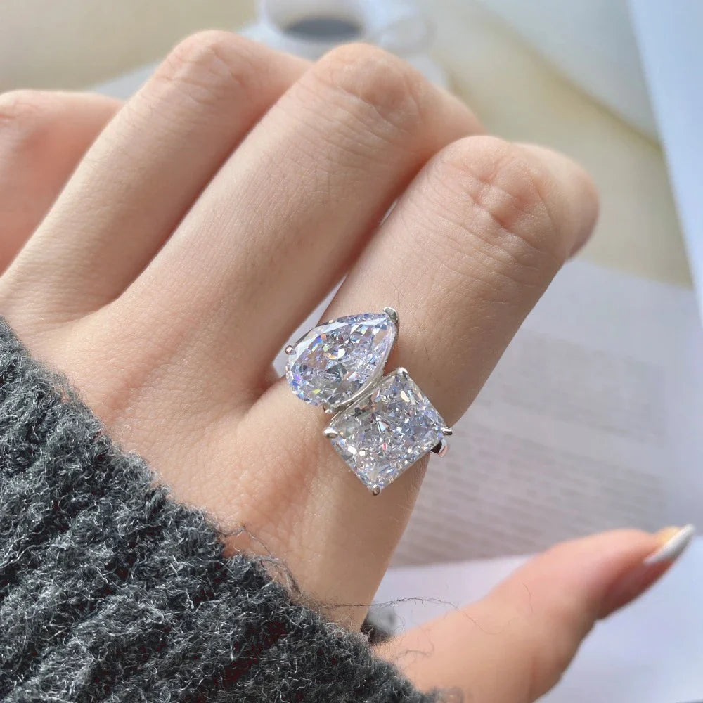 Elegant pear-shaped two-tone diamond ring with a captivating silhouette and premium finish