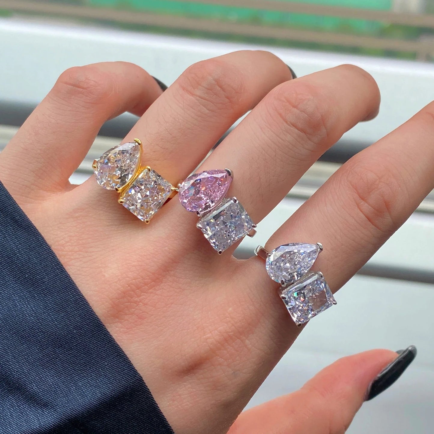 Elegant pear-shaped two-tone diamond ring with a captivating silhouette and premium finish