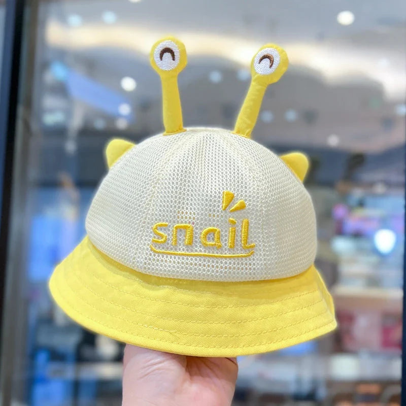 A blue cotton baby bucket hat with a solid colour design to protect your child from harmful UV rays.